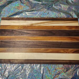 Pinstriped board with Canarywood, maple, and walnut